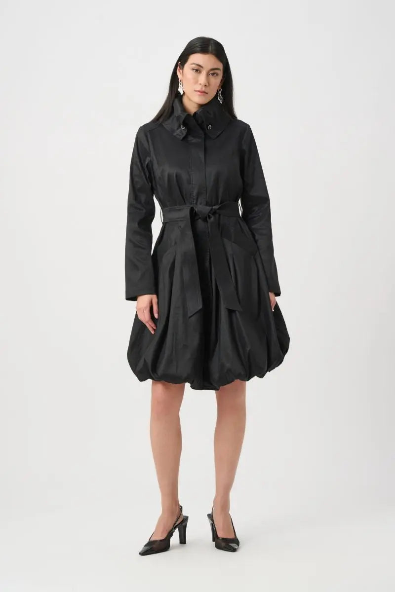 Woman wearing Joseph Ribkoff black stretch taffeta balloon coat belted front view
