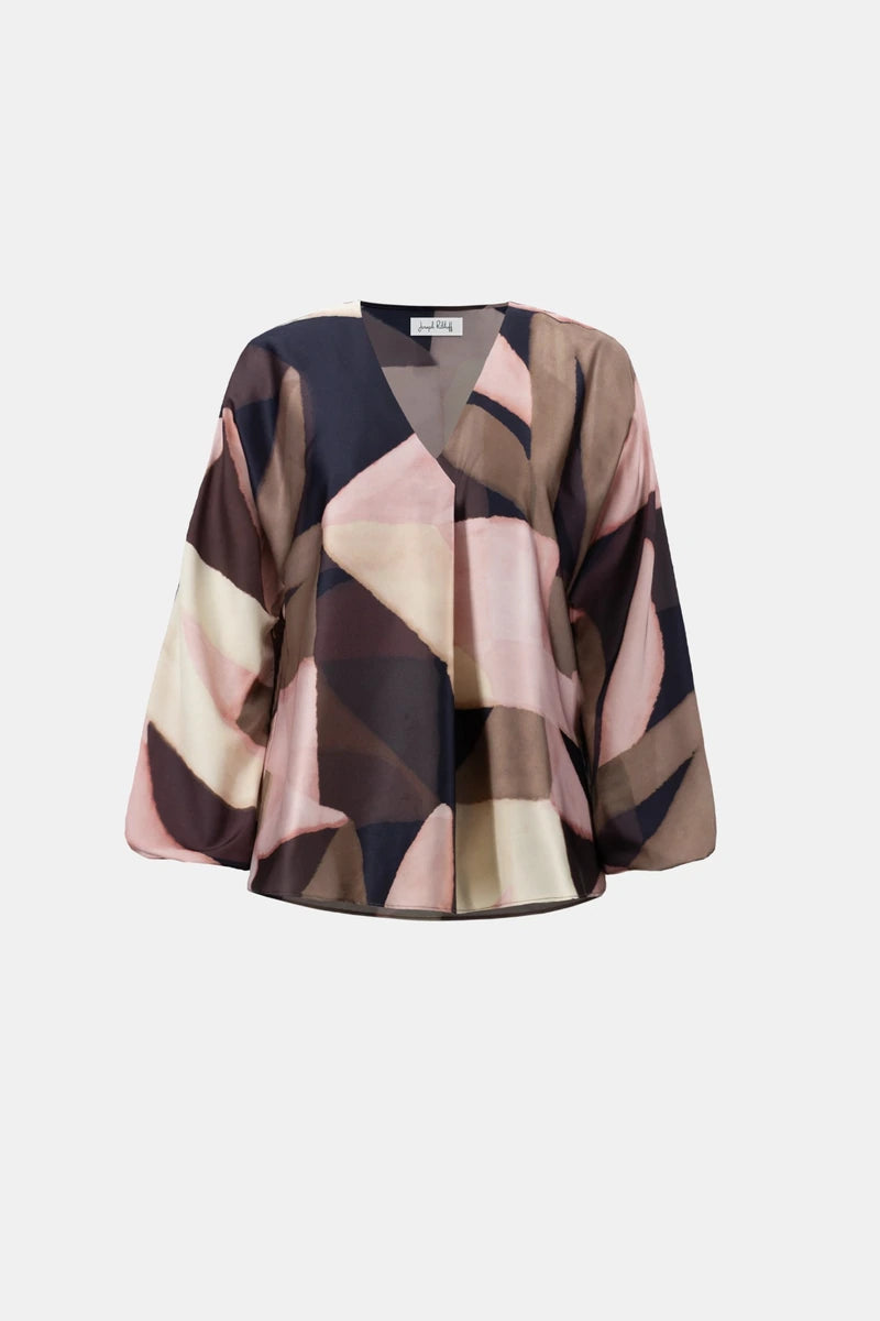 Joseph Ribkoff 264197 geometric print recycled satin top product view showing V-neckline, long sleeves and abstract pink, cream, navy and brown print