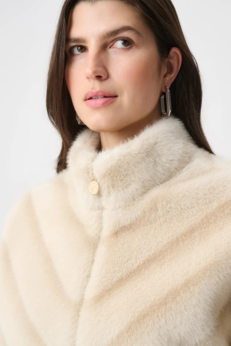 Joseph Ribkoff Chevron Faux Fur Jacket 264946 in Beige/Almond, close-up of faux fur funnel neckline and JR zip puller