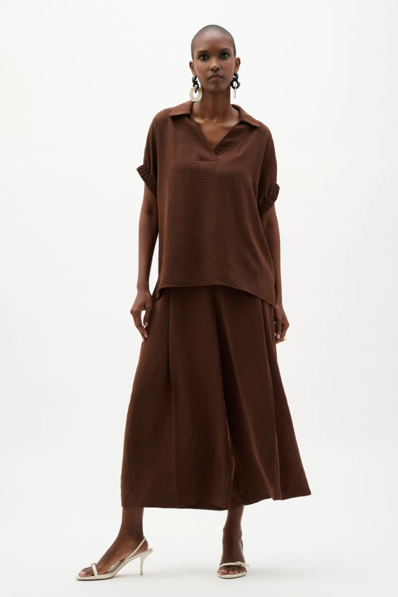 Woman wearing Woven Gauze Boxy Top With Shirred Sleeves in Mahogany by Joseph Ribkoff outfit view