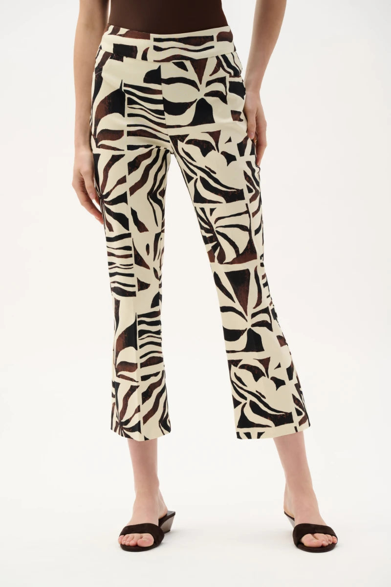 Woman wearing Millennium Tropical Print Flared Pull-On Pants in Beige/Multi by Joseph Ribkoff front view