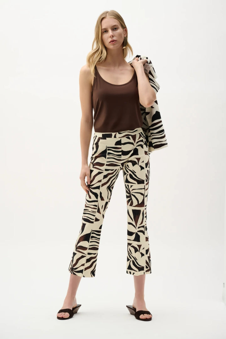 Woman wearing Millennium Tropical Print Flared Pull-On Pants in Beige/Multi by Joseph Ribkoff outfit view