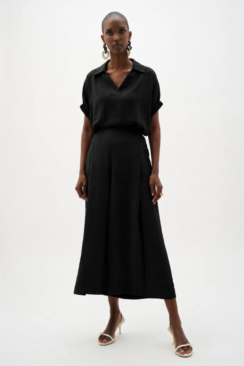 Woman wearing Gauze Pull-On Culotte Pants With Pleats in Black by Joseph Ribkoff outfit view
