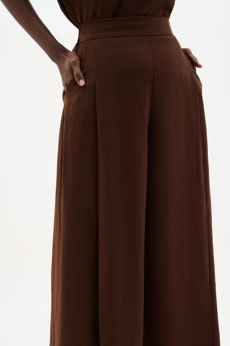 Woman wearing Gauze Pull-On Culotte Pants With Pleats in Mahogany by Joseph Ribkoff detail view