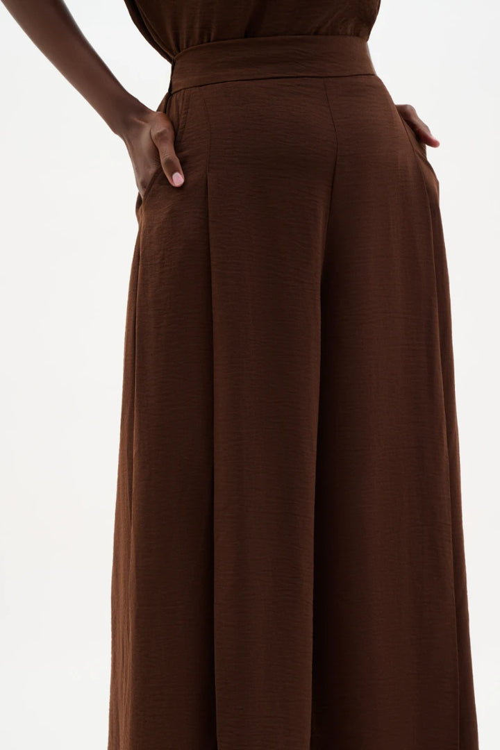Woman wearing Gauze Pull-On Culotte Pants With Pleats in Mahogany by Joseph Ribkoff detail view