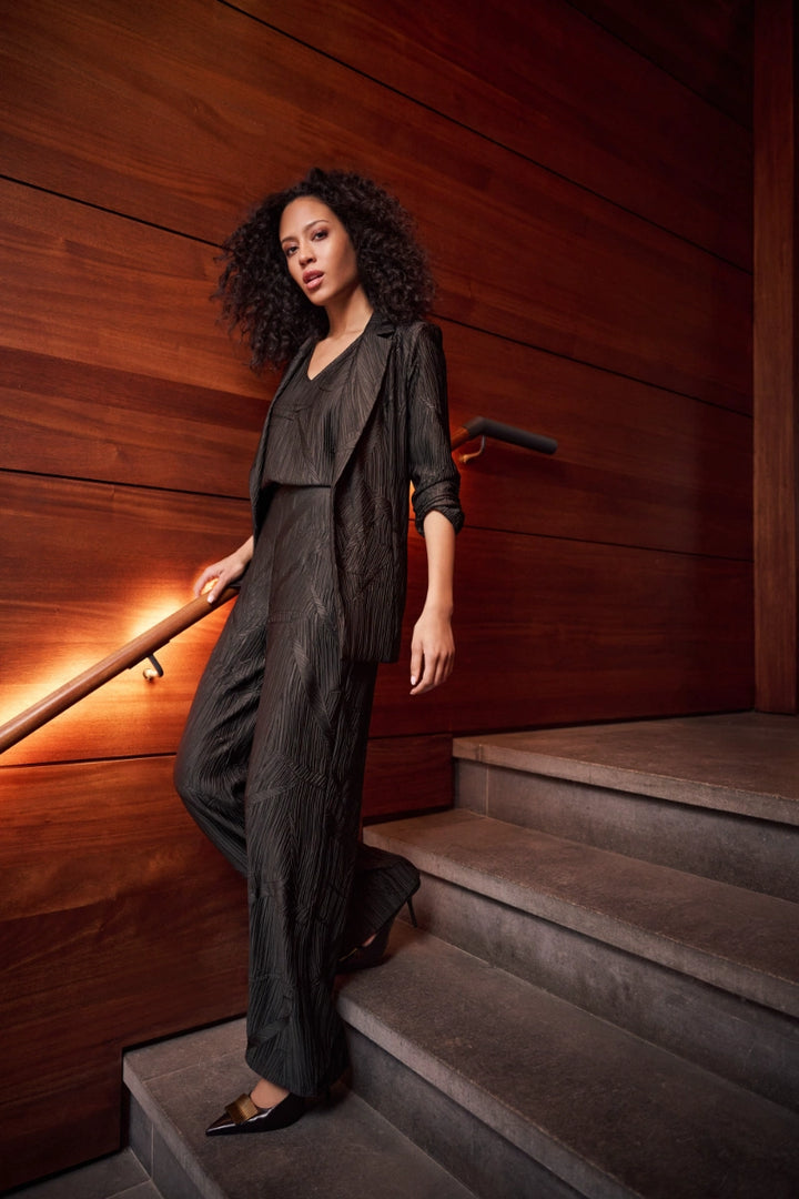 Woman wearing Pleated Satin Pull-On Wide-Leg Pants in Mocha by Joseph Ribkoff lifestyle view