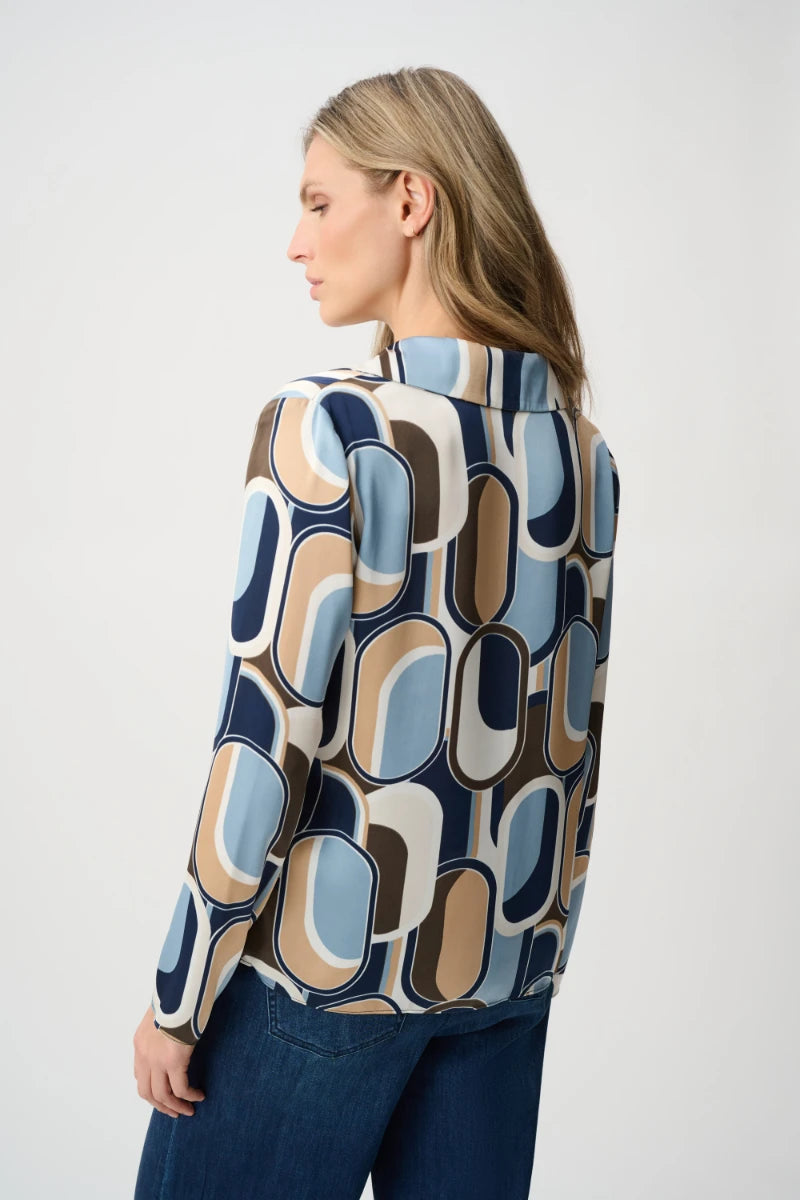 Woman wearing Recycled Satin Geometric Top in Off White/Multi by Joseph Ribkoff back view