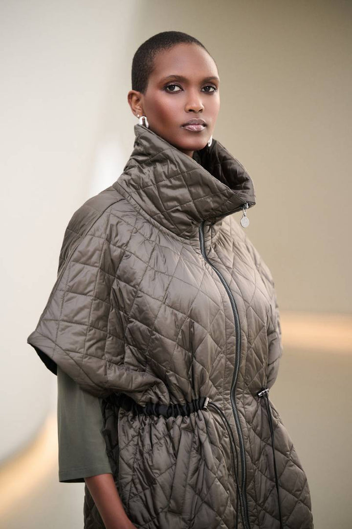 Joseph Ribkoff quilted vest in avocado  styled layered outfit