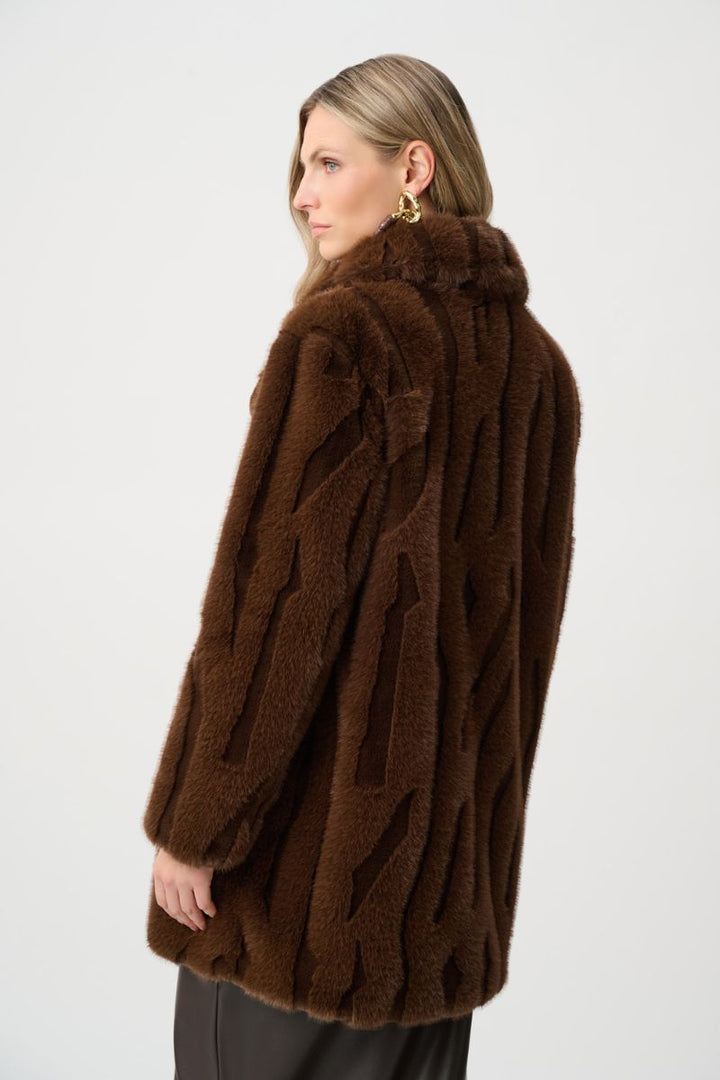 Woman wearing faux fur coat by Joseph Ribkoff style 263916 back