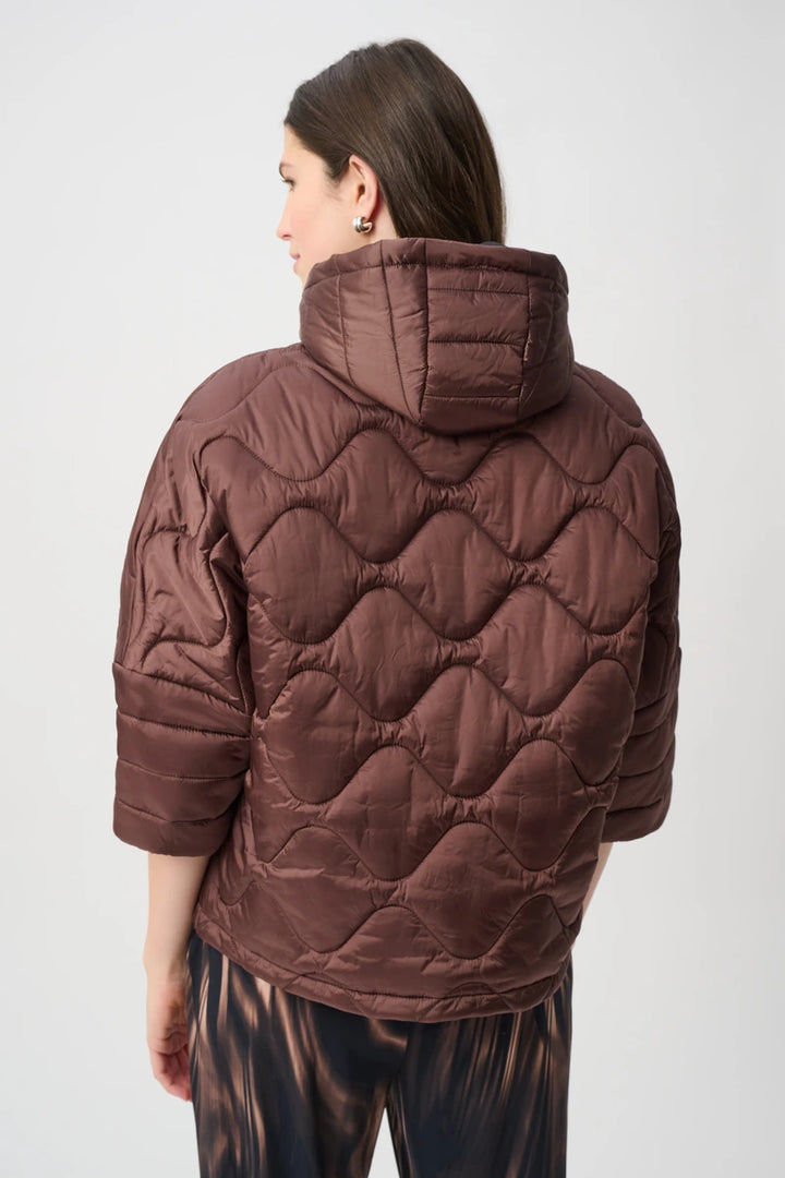 Woman wearing Hooded Quilted Cocoon Jacket in Mahogany by Joseph Ribkoff back view