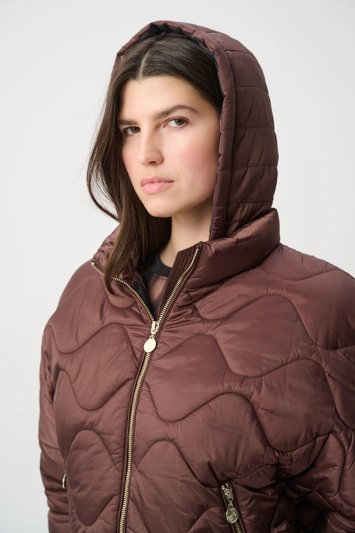 Woman wearing Hooded Quilted Cocoon Jacket in Mahogany by Joseph Ribkoff closeup view