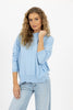 klara-sweater-in-light-blue-humidity-lifestyle-front-view_1200x
