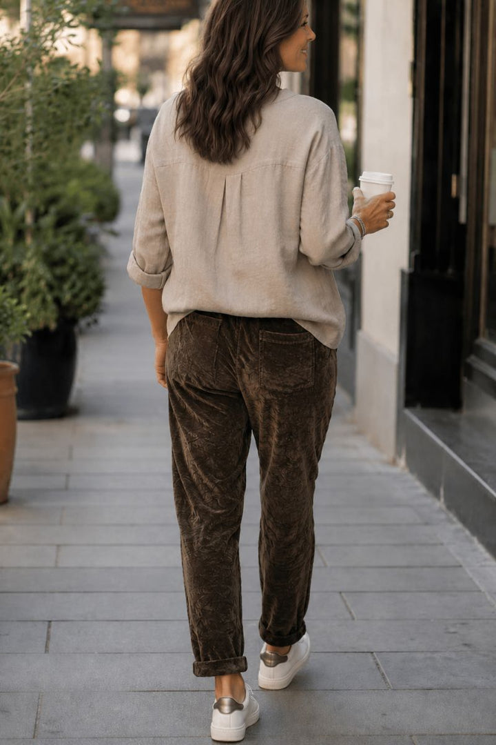Woman wearing velvet jogger in Chocolate by La Strada back