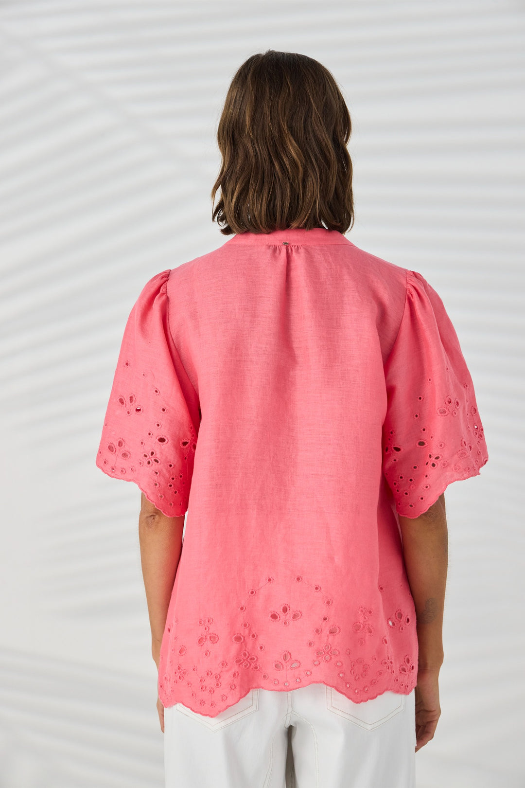 Lania the Label Kasia Shirt NLA4076 in Coral, back view showing relaxed linen shape and embroidered hem