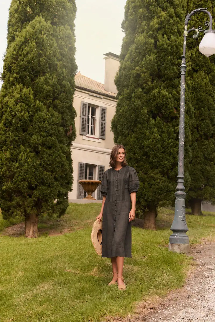 Lania Chase Dress NLA4088 in Cocoa, full front view showing button-through linen midi dress outside in garden