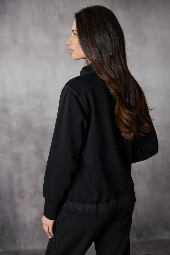 Woman wearing Bastian Jacket in Black by Lania The Label NLA3946 back view