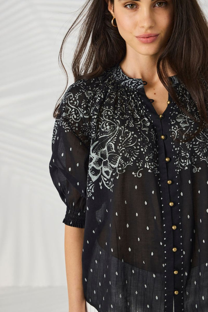 Lania Novo Shirt side view showing drape and sleeve detail NLA4026