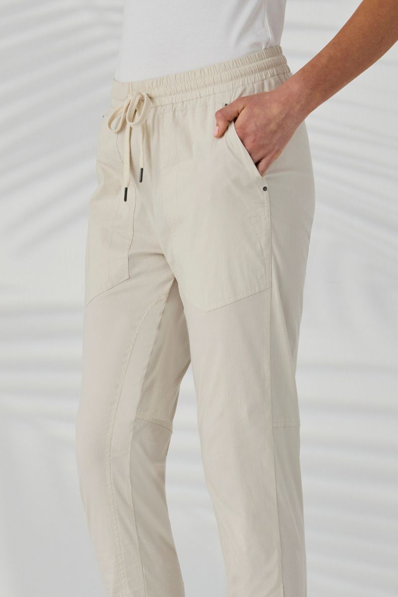 Lania Port Pant side view showing 7/8 length and cuff detail almond