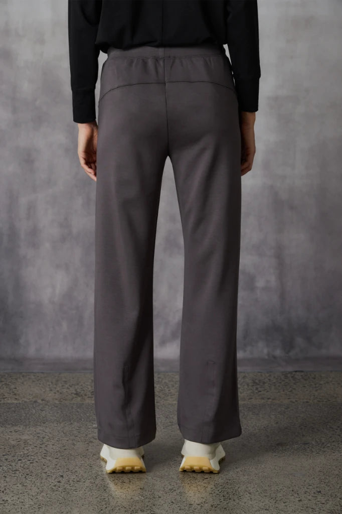 Woman wearing Bastian Pant in Carob by Lania The Label NLA3971 back view