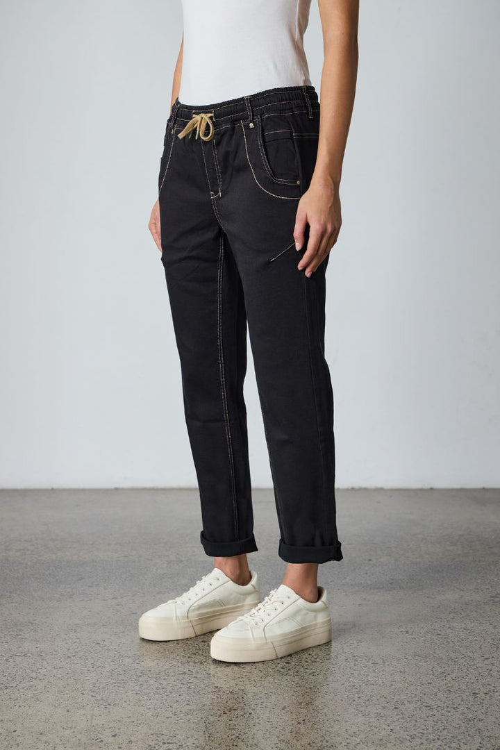 Lania The Label Casual Drawstring Jean in Black NLA2760NB side view showing relaxed silhouette