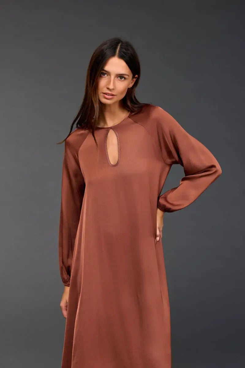 Woman wearing Conti Sienne Dress in Sienne by Lauren Vidal front