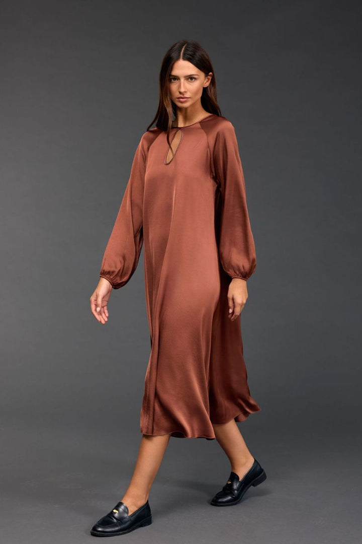 Woman wearing Conti Sienne Dress in Sienne by Lauren Vidal side
