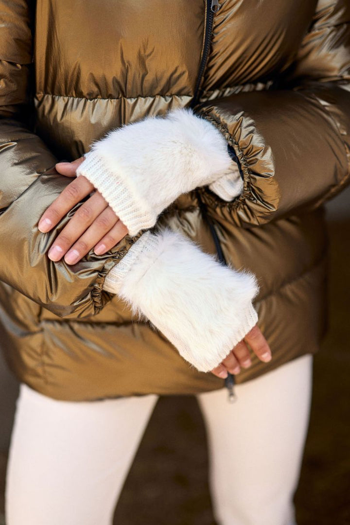 Detail of fingerless fluffy gloves in Creme by Lauren Vidal