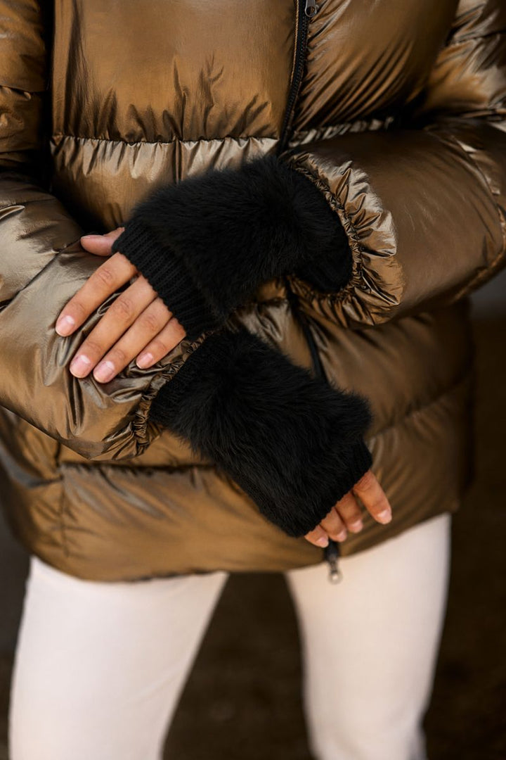 Detail of fingerless fluffy gloves in Noir by Lauren Vidal