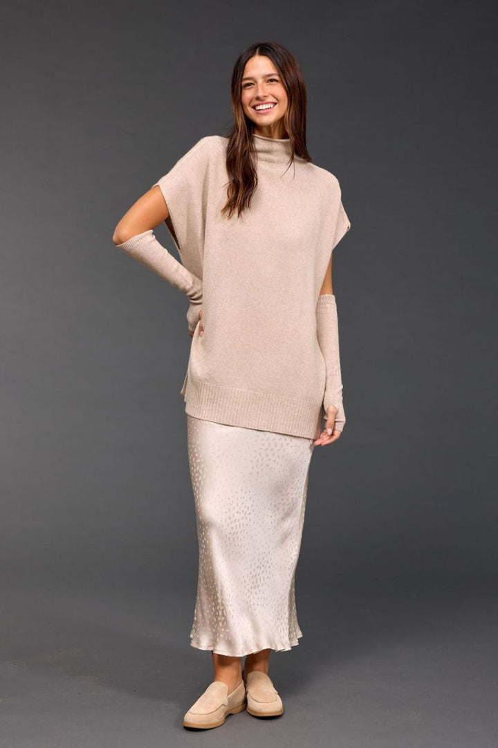 Woman wearing Judi Tunic Sweater in Sable by Lauren Vidal styled