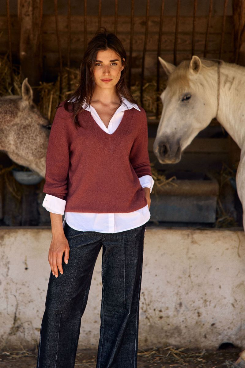 Woman wearing Logan V Neck Sweater in Granit by Lauren Vidal styled