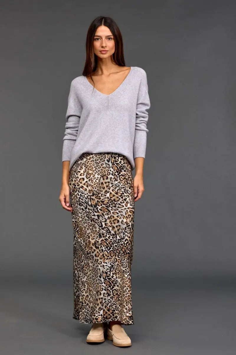 Woman wearing Logan V Neck Sweater in Grey by Lauren Vidal styled