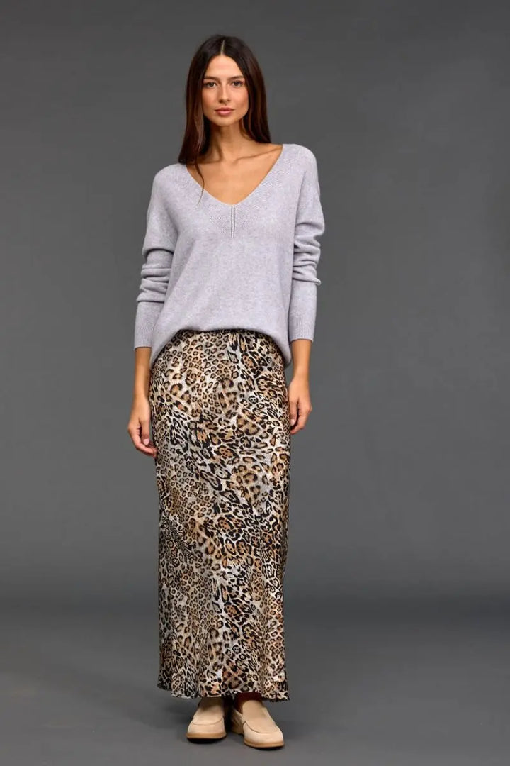 Woman wearing Logan V Neck Sweater in Grey by Lauren Vidal styled