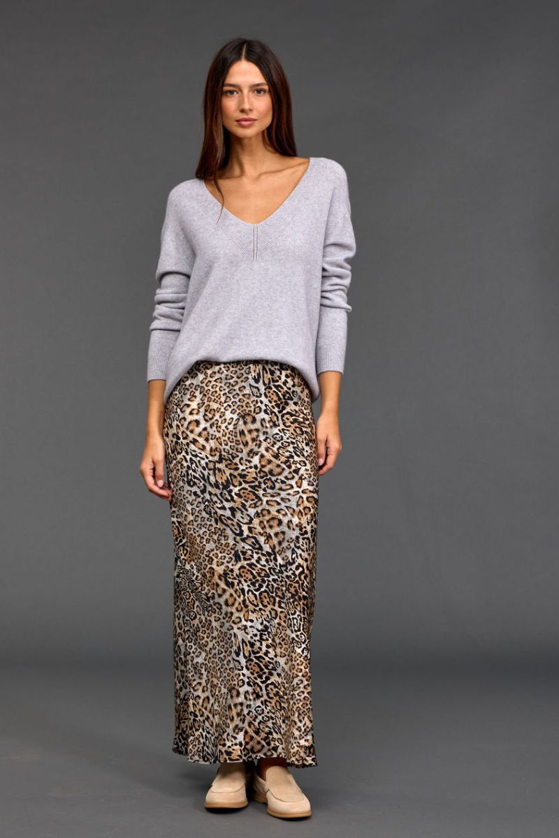 Woman wearing Logan V Neck Sweater in Grey by Lauren Vidal styled