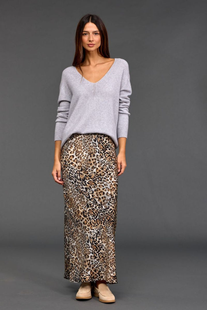 Woman wearing Logan V Neck Sweater in Grey by Lauren Vidal styled