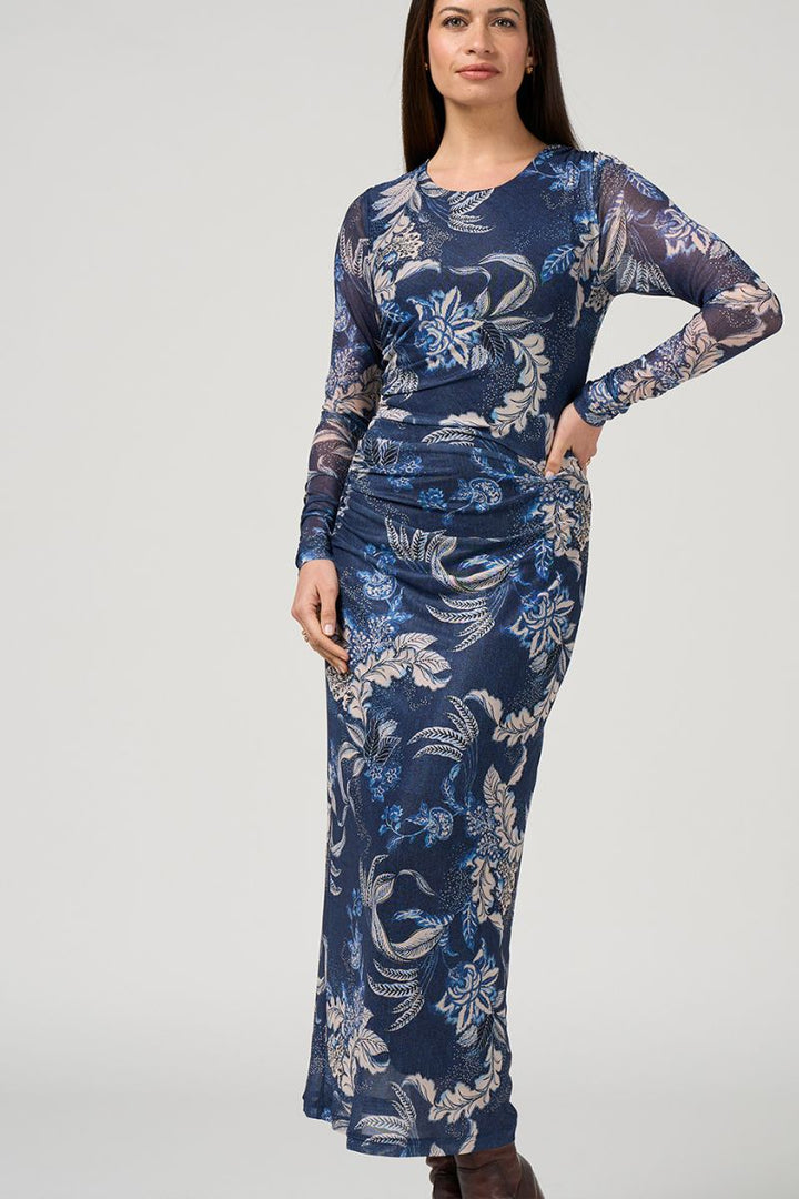 Woman wearing Casella Mesh Dress in Print by Loobie’s Story closeup