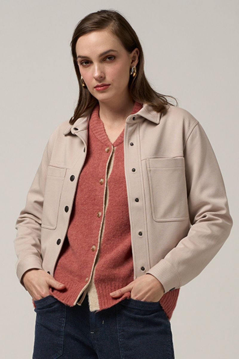 Woman wearing Madly Sweetly matchwork jacket in stone MS1531 front