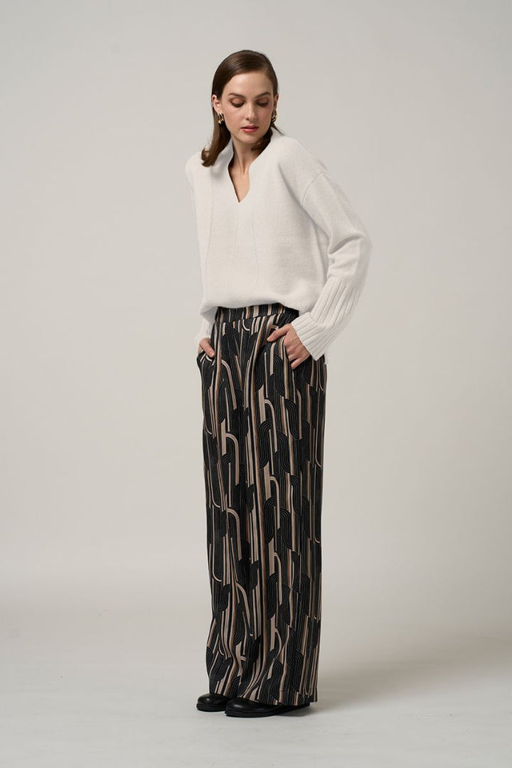Woman wearing Madly Sweetly Freefall pant black multi MS1565 front