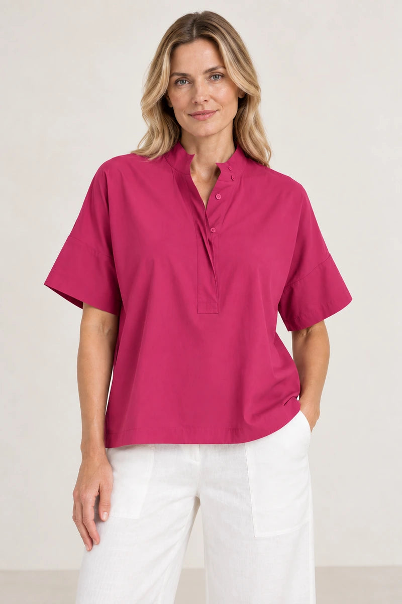 Mela Purdie Tab Shell F65 80089 in Raspberry, bright pink colourway shown on model with white pants.