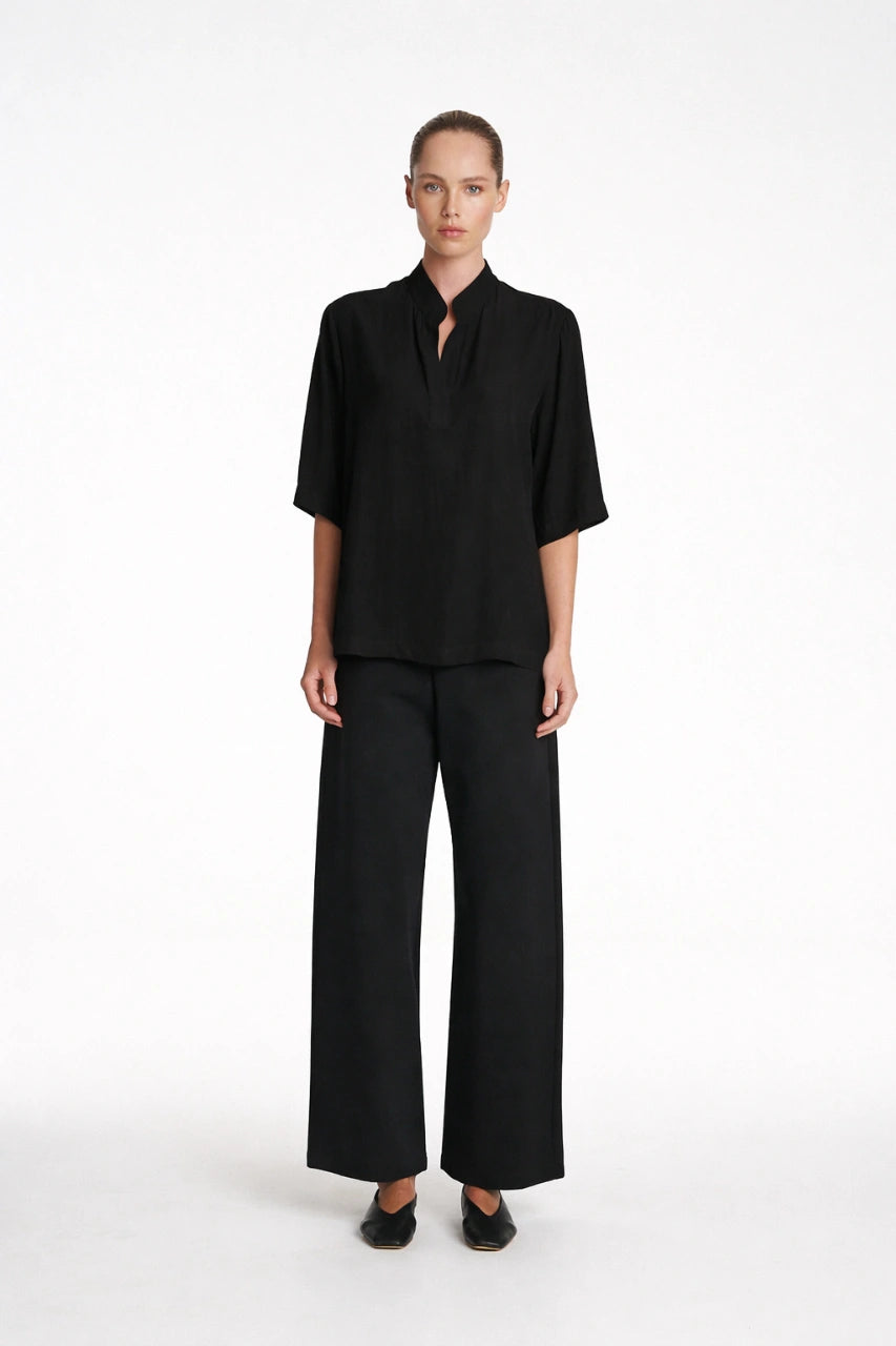 Woman wearing Placket Plaza Shirt in Black by Mela Purdie F67 8991 front