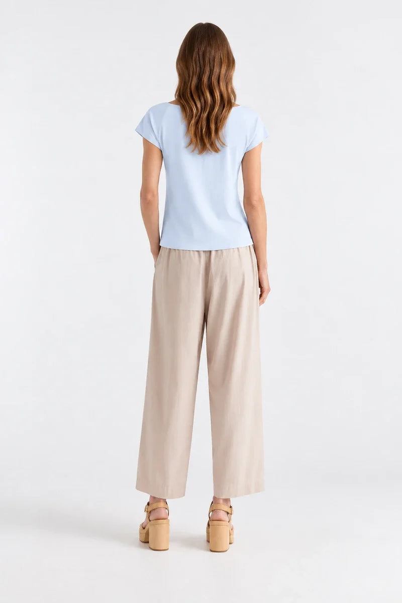 AI-generated model wearing Mela Purdie Raglan Shell F01 212 in Dream, back view