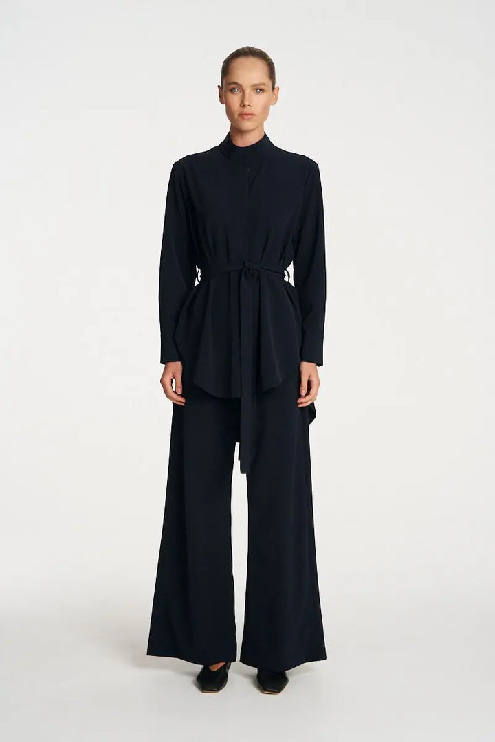 Woman wearing Cylinder Tunic in Black by Mela Purdie front