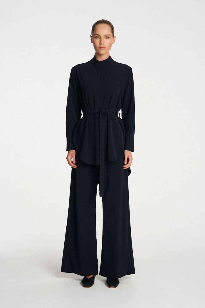 Woman wearing Cylinder Tunic in Black by Mela Purdie front