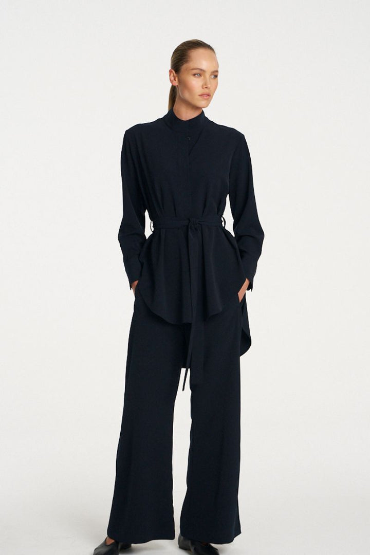 Woman wearing Cylinder Tunic in Black by Mela Purdie styled