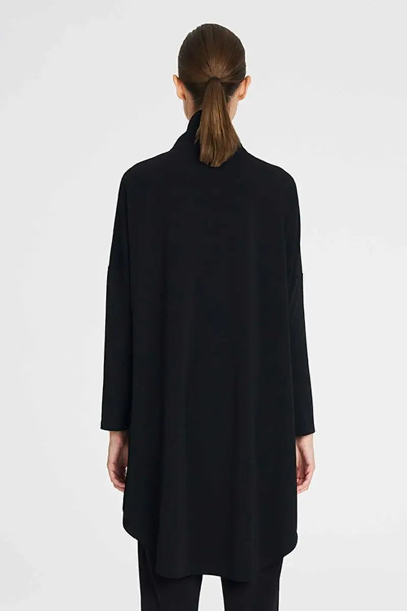 Woman wearing Tab Funnel Jacket in Black by Mela Purdie back