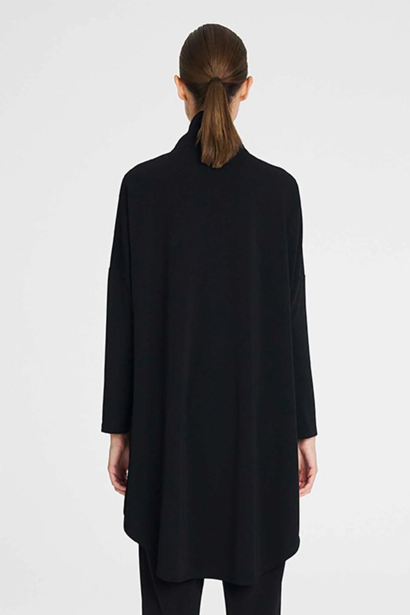 Woman wearing Tab Funnel Jacket in Black by Mela Purdie back