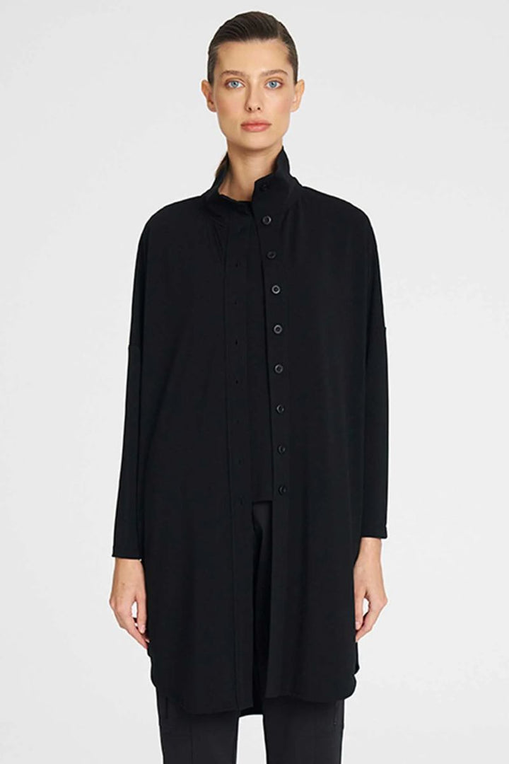 Woman wearing Tab Funnel Jacket in Black by Mela Purdie front