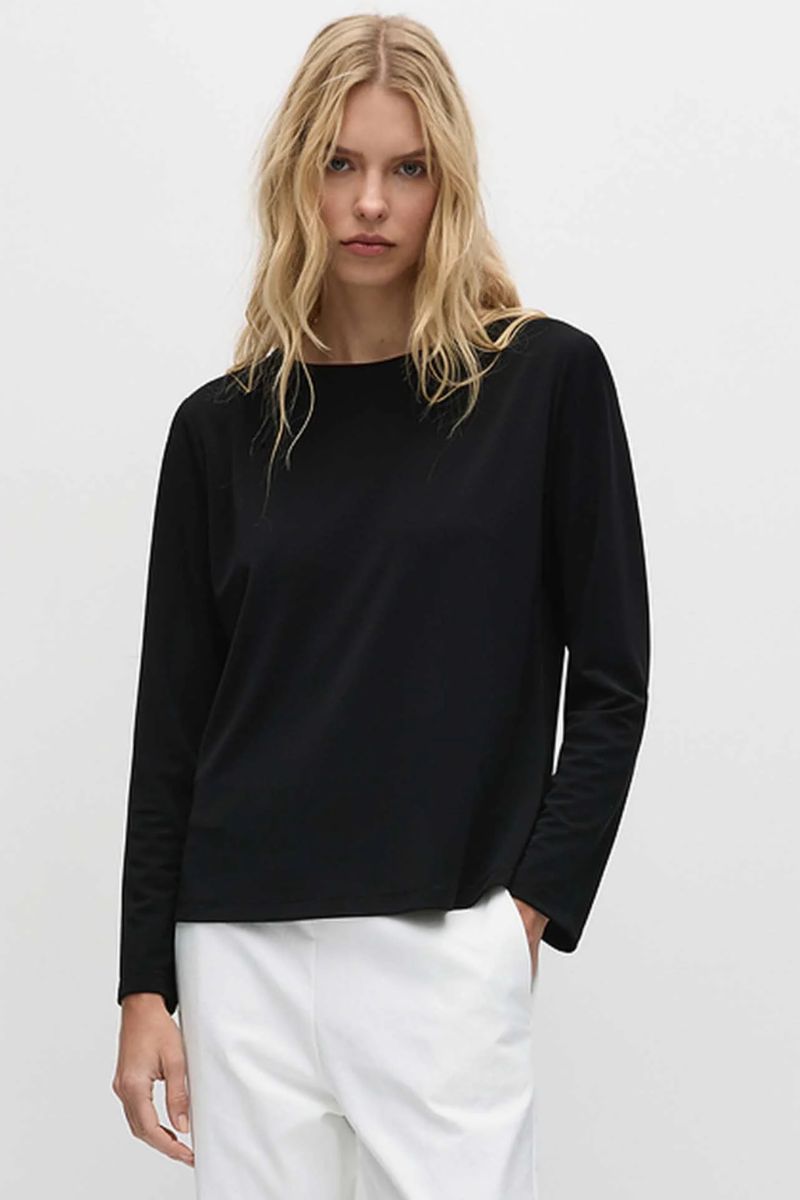 Woman wearing LS Powder Boater in Black by Mela Purdie style F007 8692 closeup