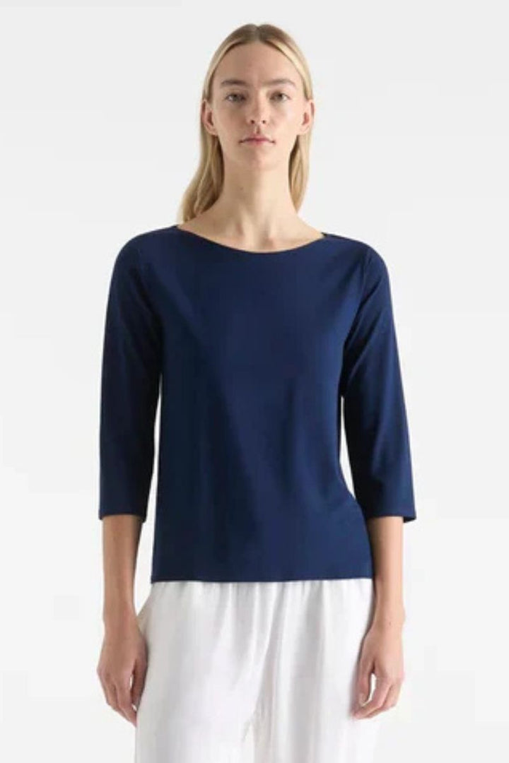 Woman wearing Relaxed Boat Neck in Denim by Mela Purdie style F01 2630 front