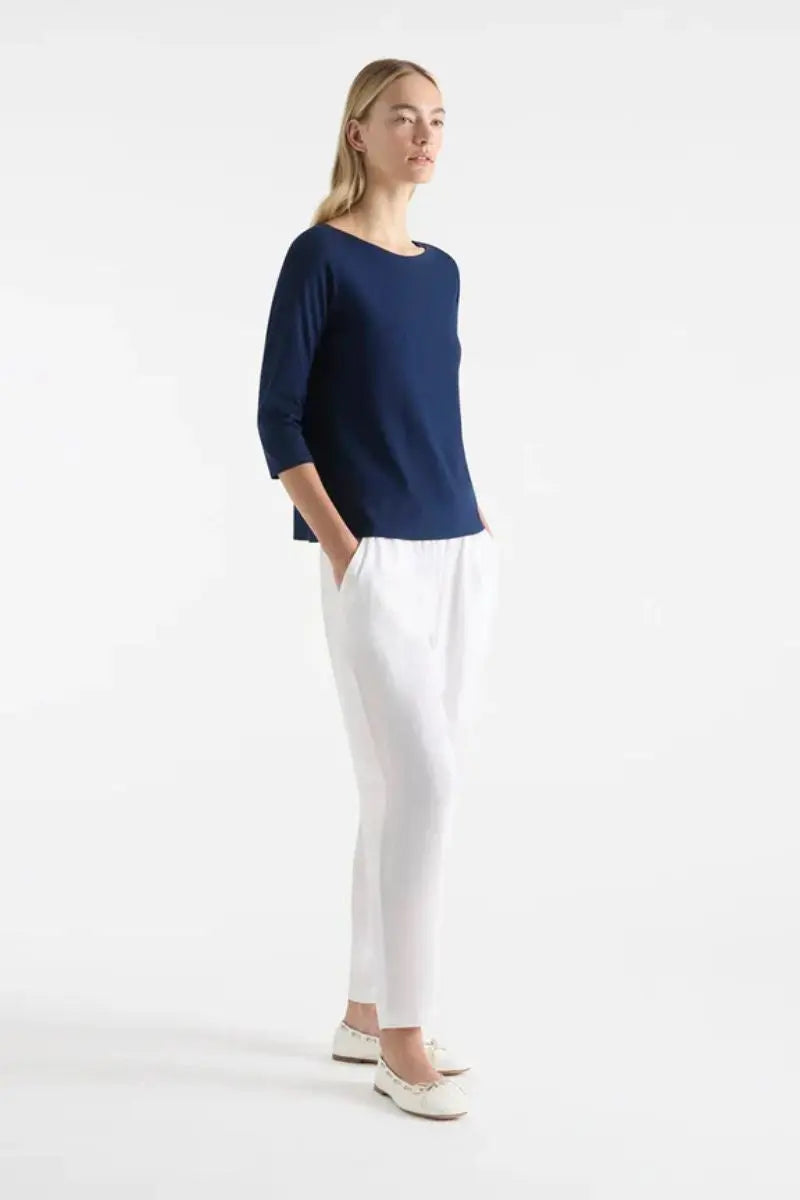 Woman wearing Relaxed Boat Neck in Denim by Mela Purdie style F01 2630 side