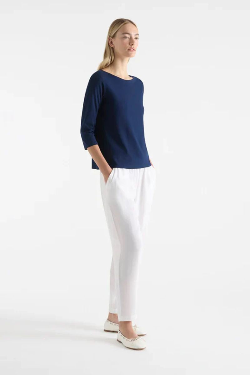 Woman wearing Relaxed Boat Neck in Denim by Mela Purdie style F01 2630 side